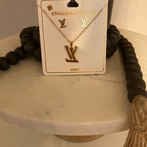 Louis Vuitton earrings and necklace